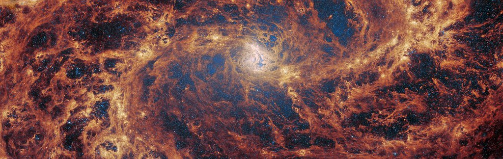 Treat yourself to the bewitching sight of barred spiral galaxy M83 — which comes alive with detail in this new image by the Webb telescope’s MIRI instrument.
