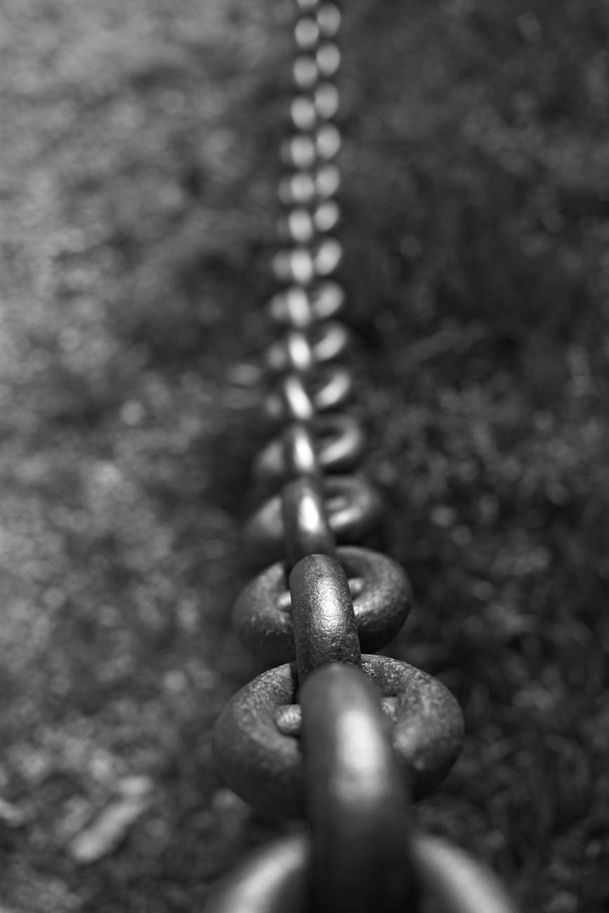 metal chain in grayscale and closeup photo